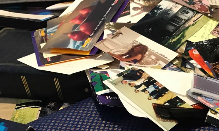 Physical Photo and Memorabilia Organizing-pile of photo albums, physical photos, negatives, photo envelopes